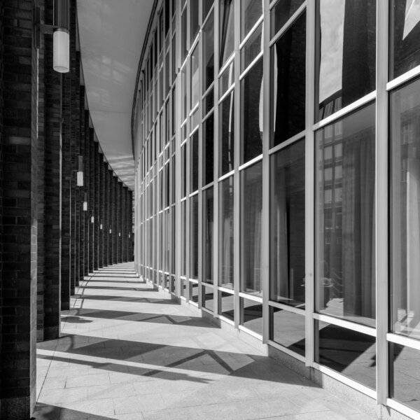 Black and white architectural photo with reflections in Hamburg.